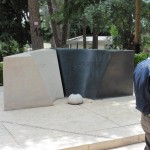 The grave of Yitzchak Rabin and his wife. It is differently shaped than the rectangles of the other graces in this cemetary, as Rabin was assassinated.