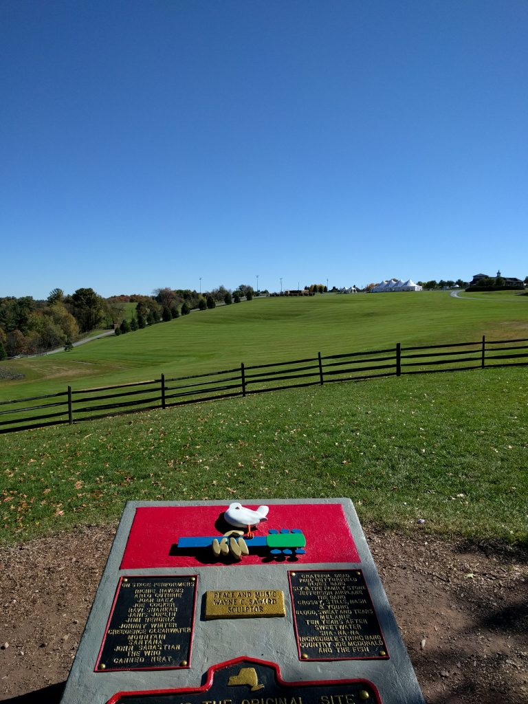 Memorial marks roughly the positioning of the stage at Yasgur Farms where the Woodstock Festival occured. The attendees would have been on the hill in the distance